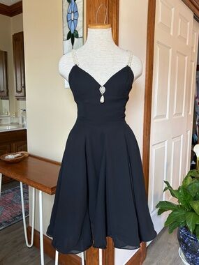 Vintage Cache Black Mini Dress with Pearl-Strap Detail
